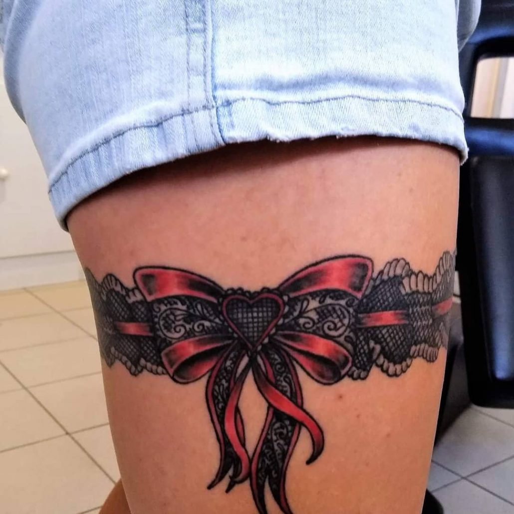 garter tattoo with a bow