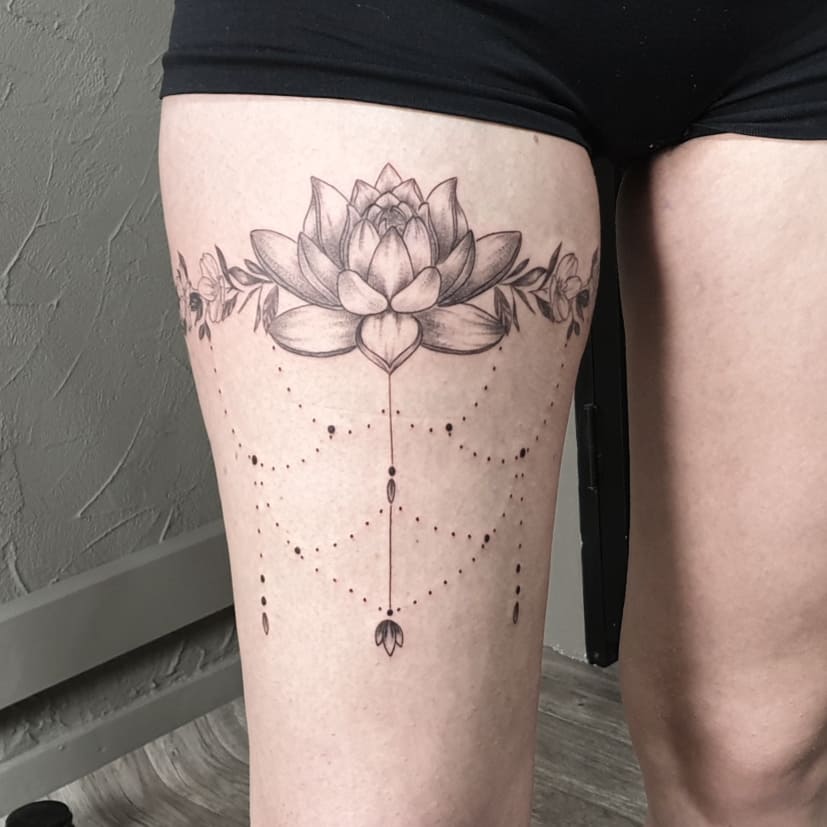 garter tattoo with a flower