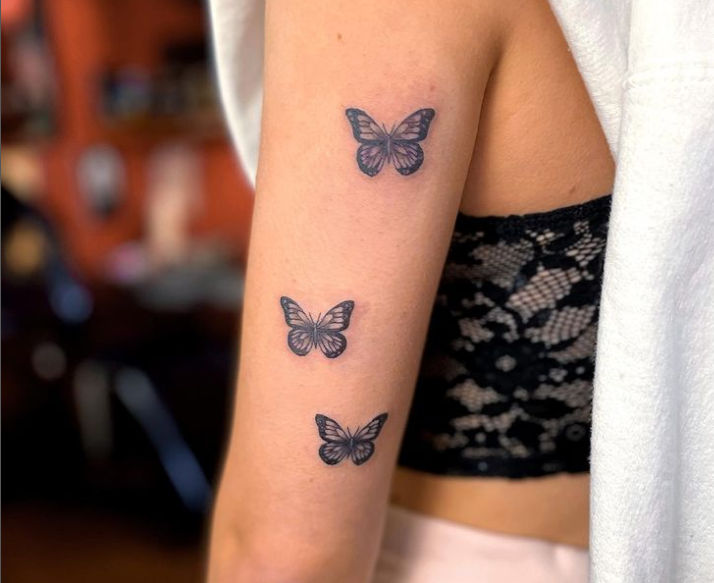 simple butterflies tattoo