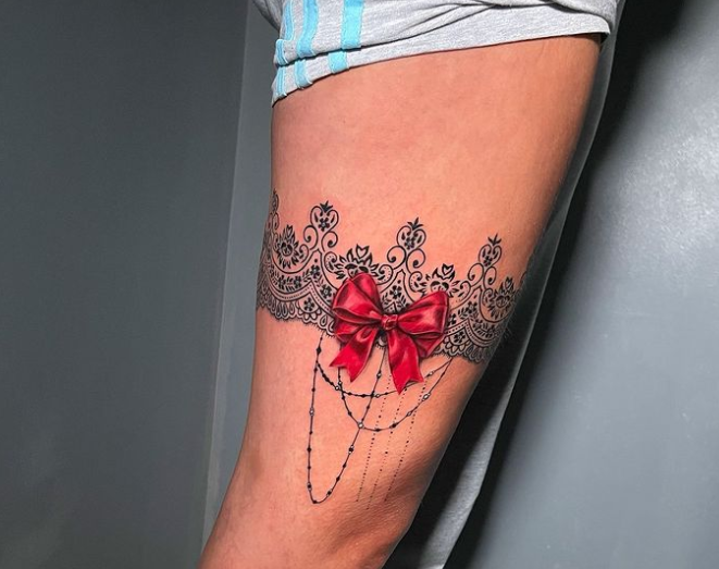 garter tattoo with a bow