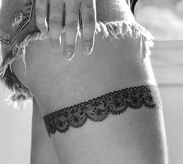 ribbon garter tattoo