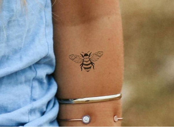Black And White Bee Tattoo
